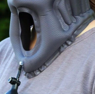 Tactical backpack with multiple compartments and MOLLE webbing for outdoor survival gear.