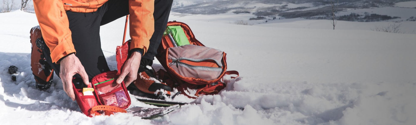 Comprehensive first aid kit for outdoor survival and emergency preparedness, featuring essential medical supplies.
