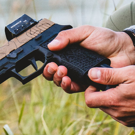 Sig Sauer P320 XTEN handgun on display, ideal for tactical use and outdoor survival scenarios.