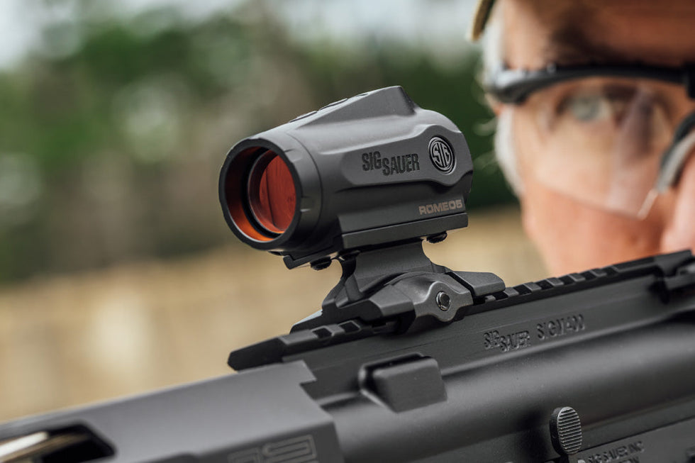 Sig Sauer ROMEO5 Gen II red dot sight on tactical rail, ideal for outdoor survival and emergency preparedness