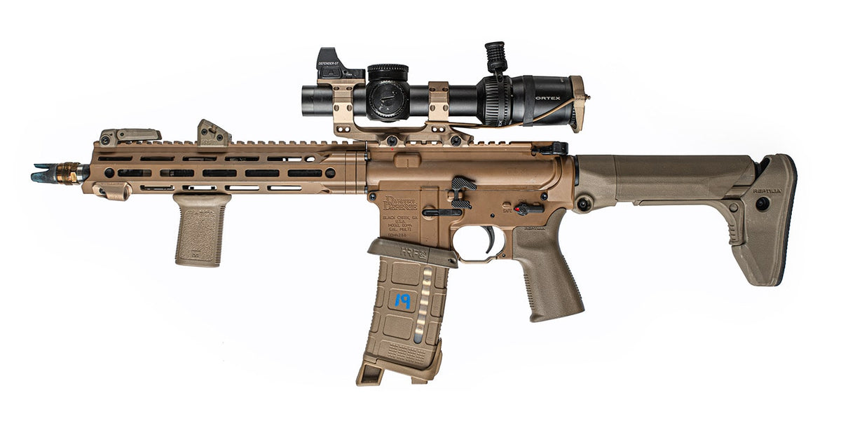 Tactical survival gear combo set with knife, flashlight, and multi-tool for outdoor preparedness.