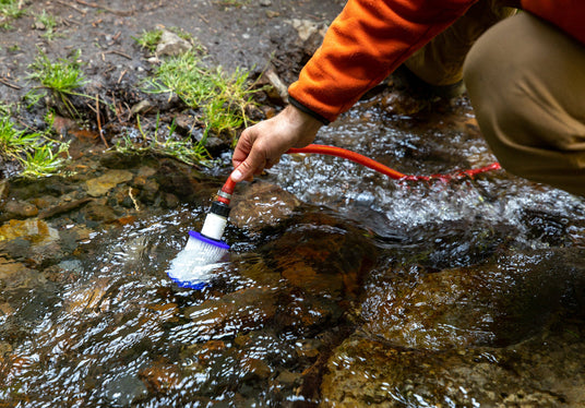 Guzzle H2O Stream prefilter drawing water from a mountain creek