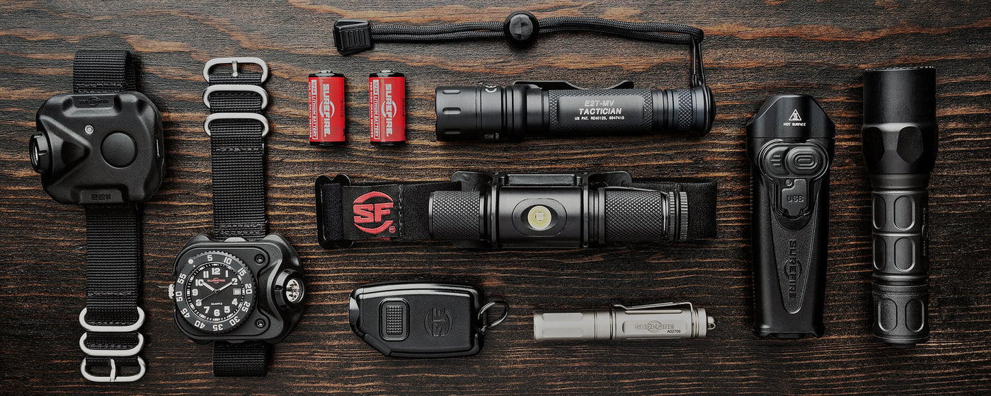 SureFire tactical illumination array for outdoor survival and emergency preparedness, showcasing advanced lighting technology
