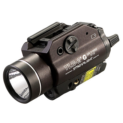 Tactical TLR-2G weapon light with green laser for outdoor survival and emergency preparedness gear.