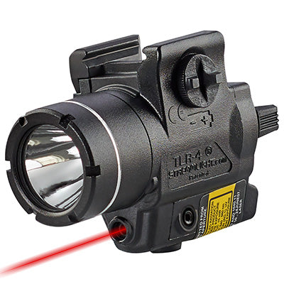 Tactical flashlight with laser sight attachment for outdoor survival and emergency preparedness.