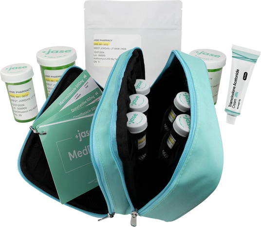 Jase Case emergency medical kit open showing prescription medication bottles, treatment guide, and organized storage pouch